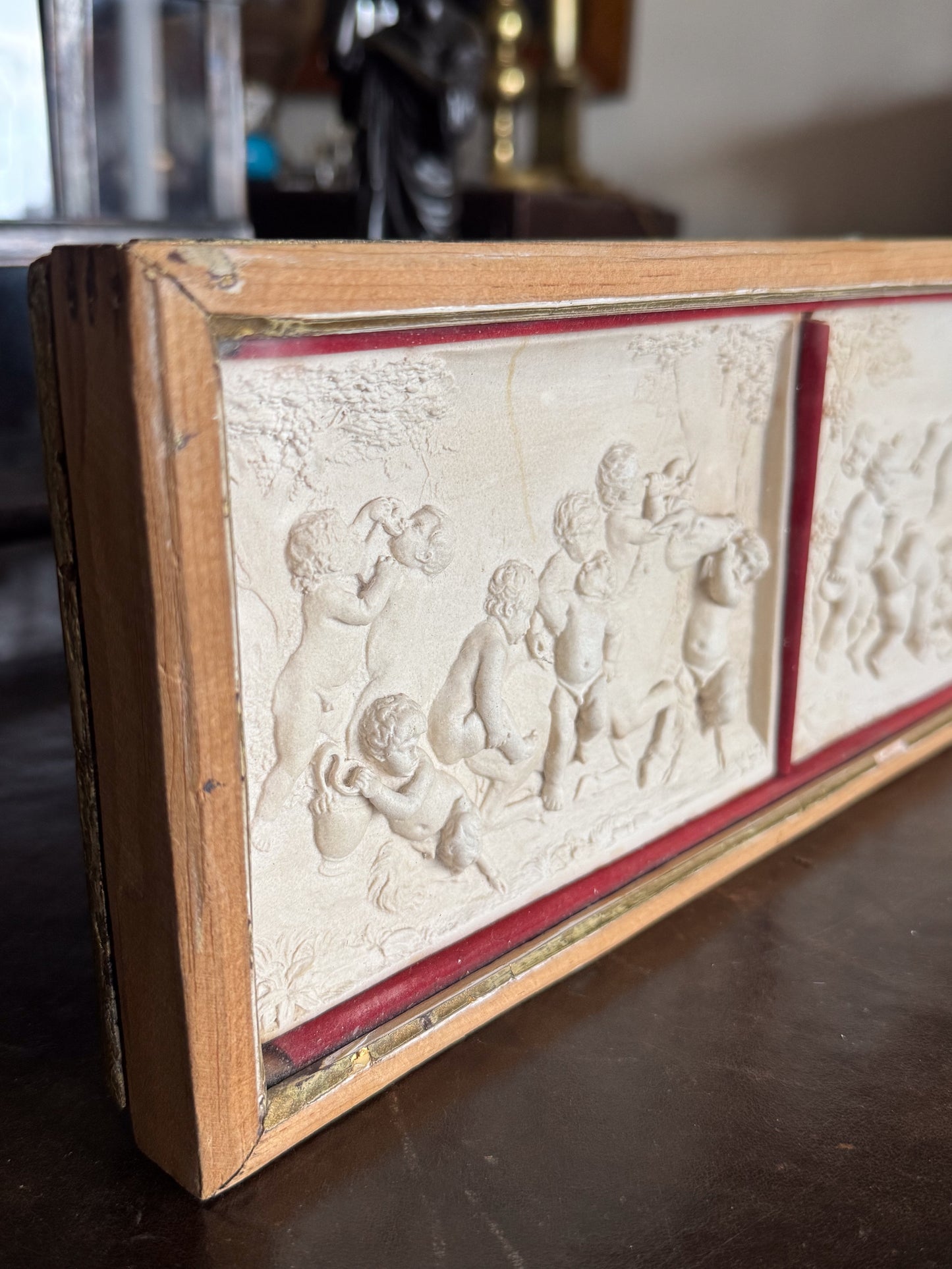 A Late 19th Century Framed Trio of Plaster Relief Plaques by Elkington & Co.
