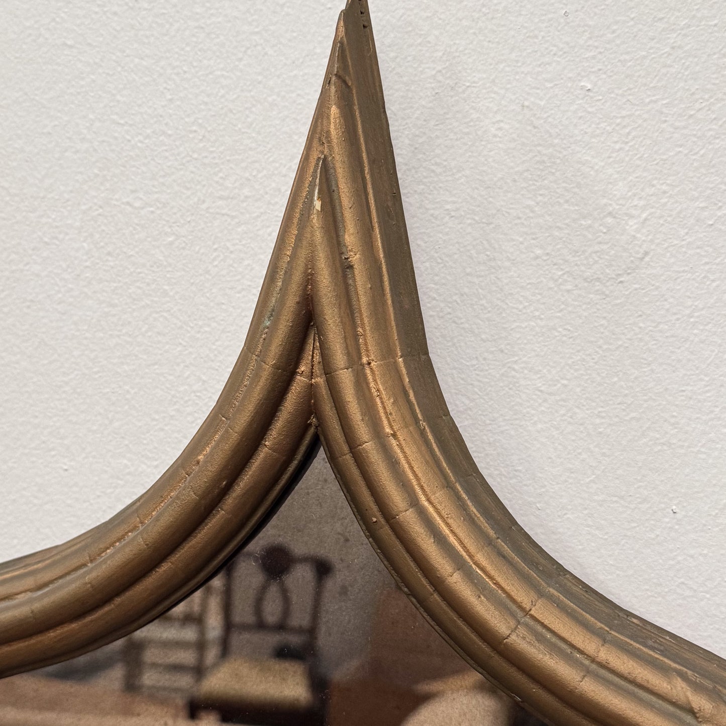 A Late 19th Century Gothic Gilt Mirror