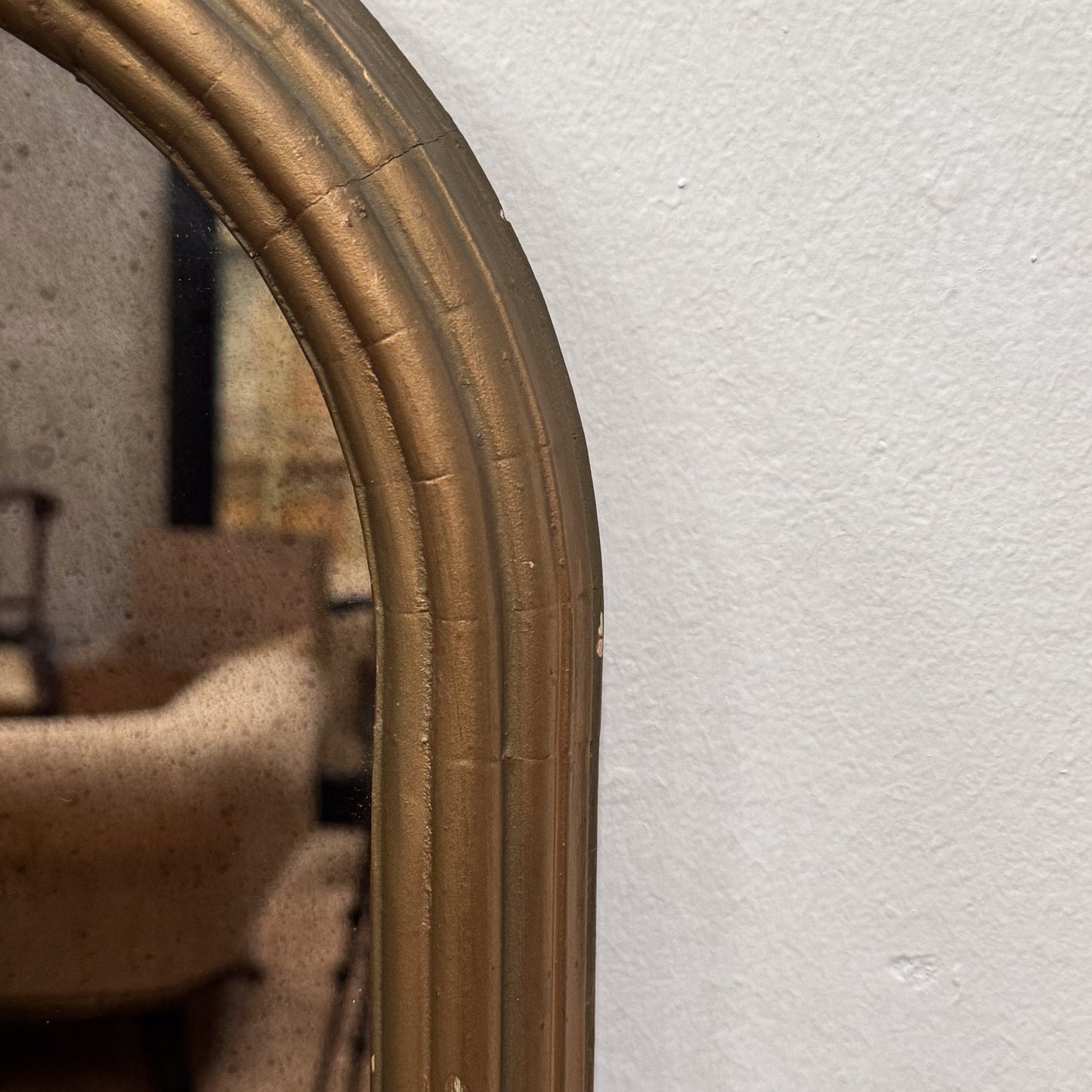 A Late 19th Century Gothic Gilt Mirror