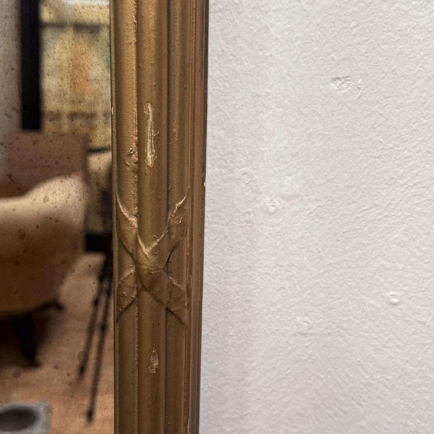 A Late 19th Century Gothic Gilt Mirror
