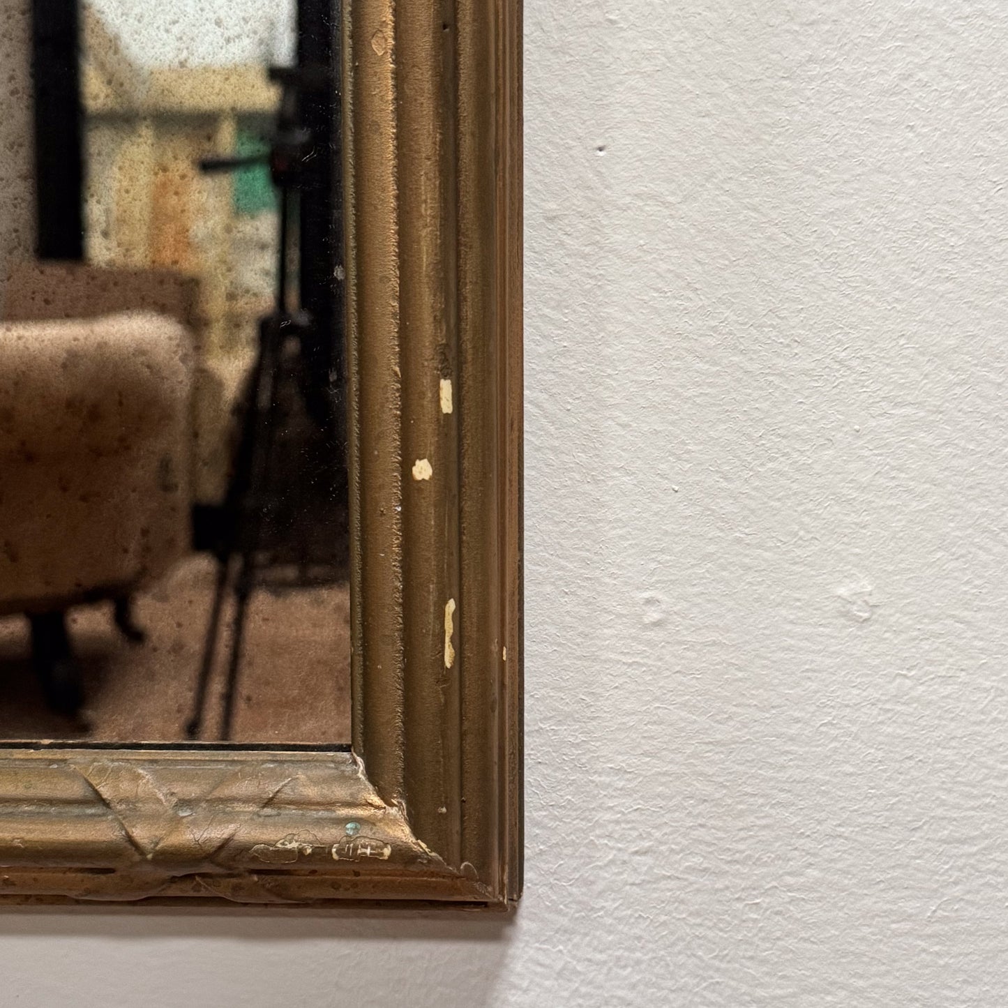 A Late 19th Century Gothic Gilt Mirror