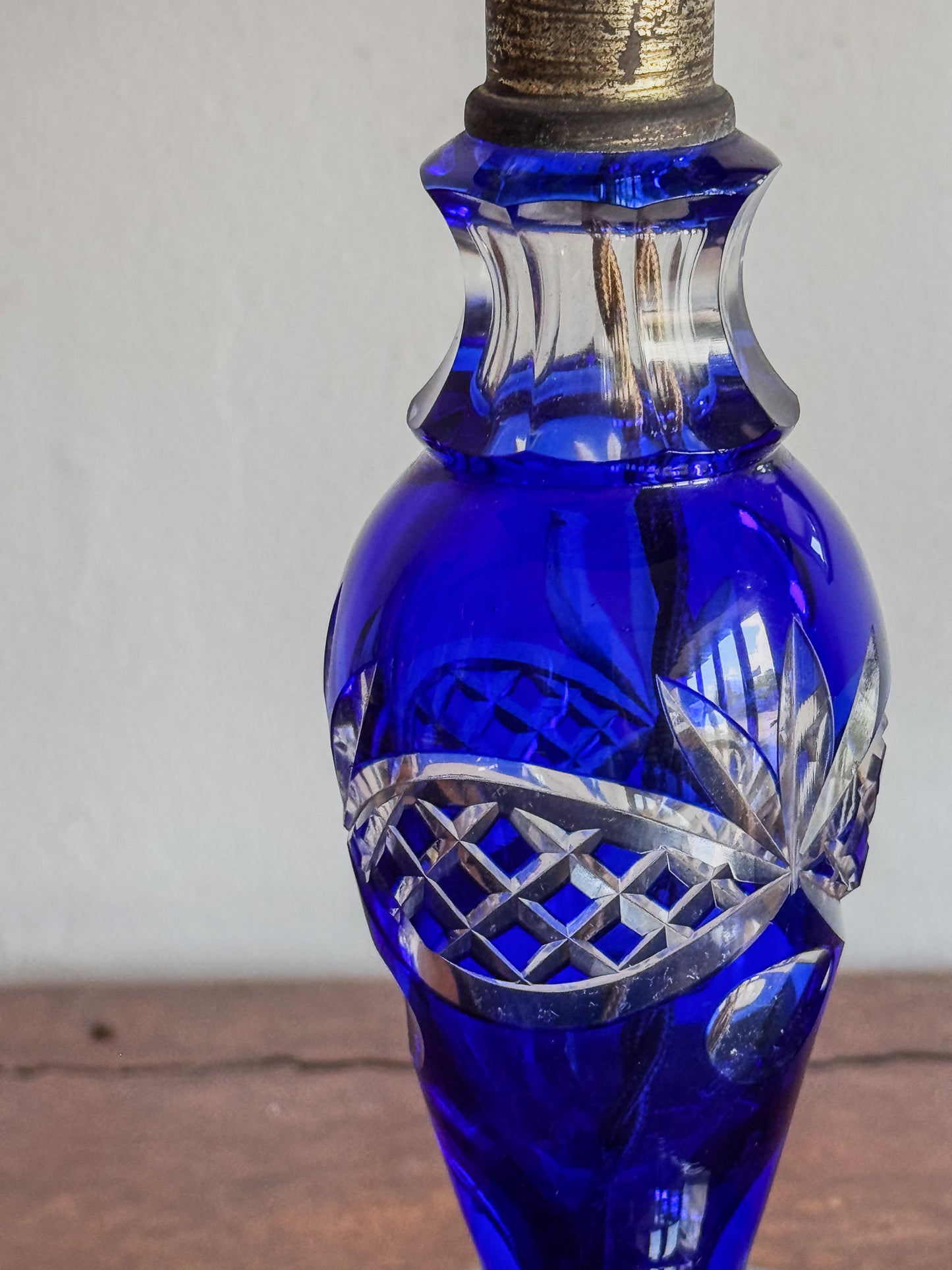 A Pair of Edwardian Bohemian Blue Cut Glass Lamps