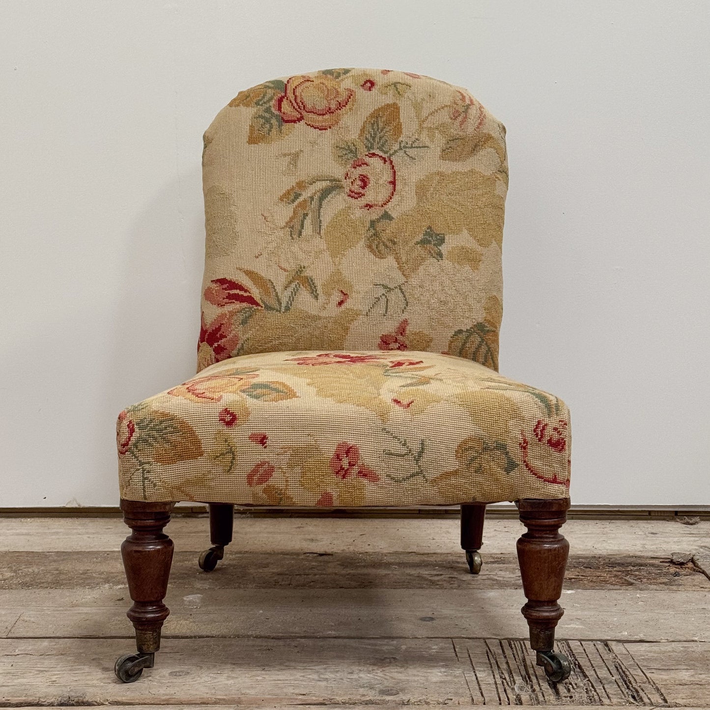 A Mid 19th Century Needlepoint Slipper Chair