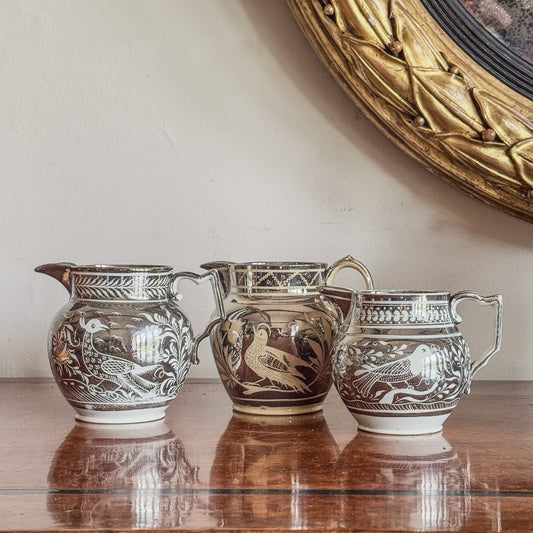 A Trio of Regency Silver Lustre Jugs