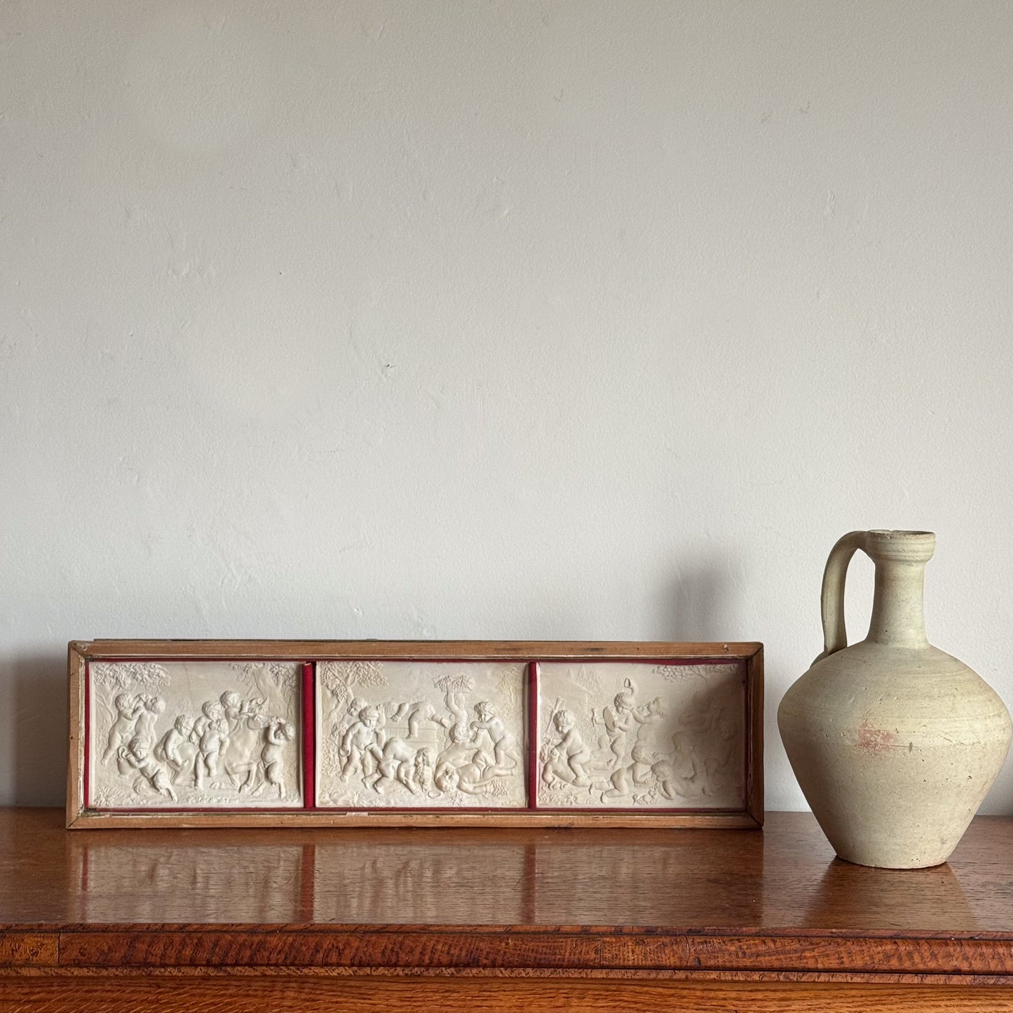 A Late 19th Century Framed Trio of Plaster Relief Plaques by Elkington & Co.